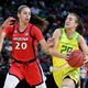 Sabrina Ionescu (r.) was the face of what has become a powerhouse women’s hoops program at Oregon.